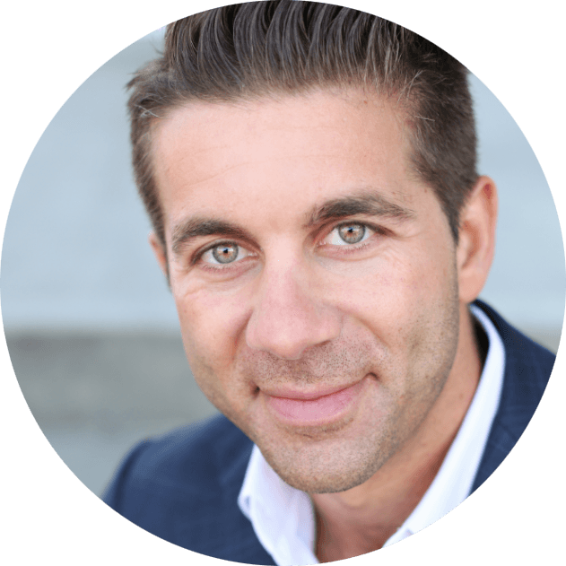 Adrian (A.J.) Hazzi of Cash Offer's headshot in navy suit and white shirt