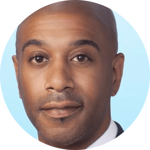 Cash Offer's Troy Howell; headshot with light blue background